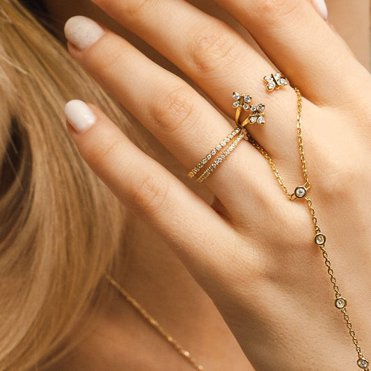 Illuminess™ Sterling Silver French Pavé Eternity Sparkle Stacking Ring BLOOMTINE | Earth Angel HQ. BLOOMTINE Illuminess silver stacking ring in rhodium-plated sterling silver. A full eternity ring featuring 1.2mm moissanites set in French Pavé. Tarnish-resistant and ethical moissanite ring