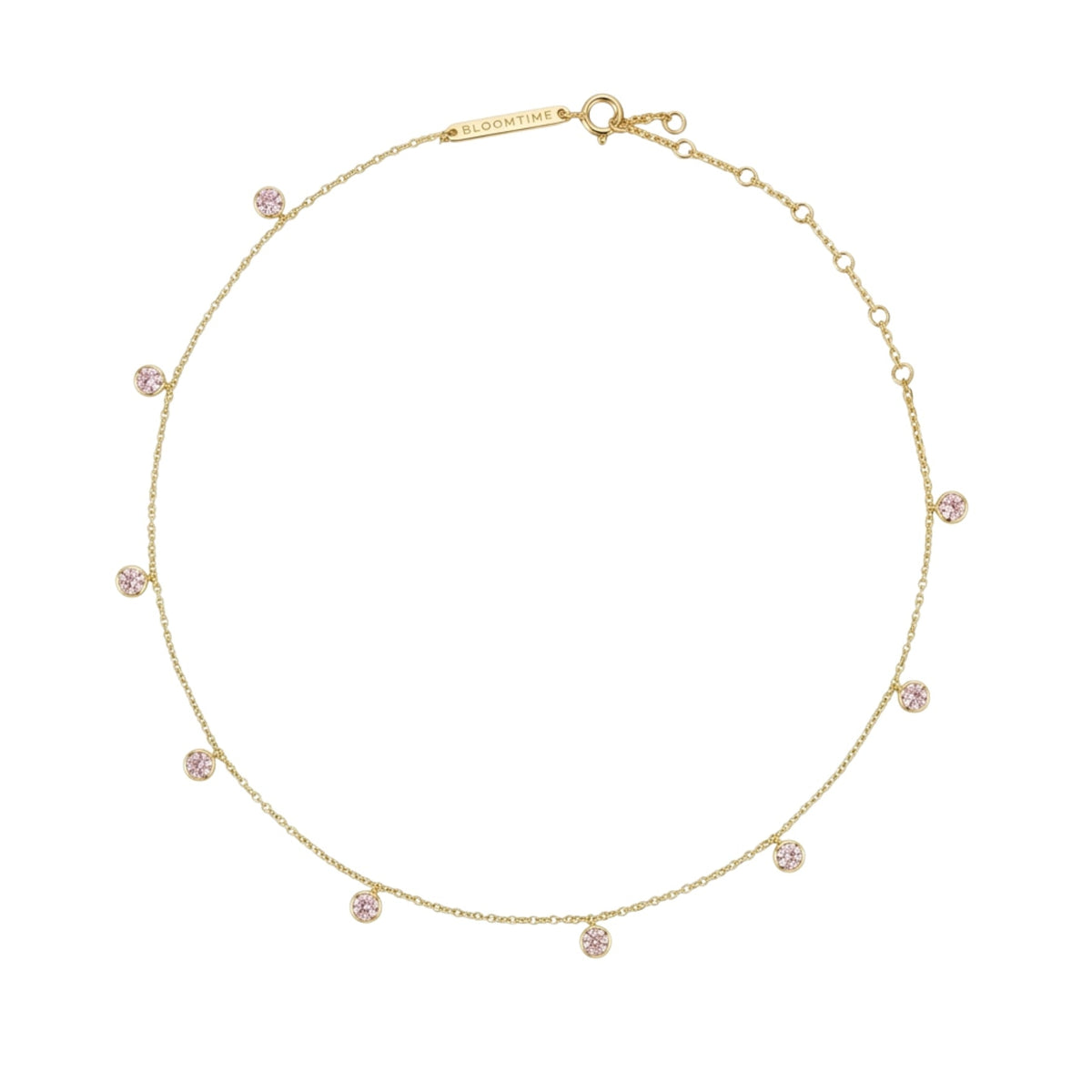 A delicate gold chain necklace with multiple small, round pink gemstone clusters spaced evenly along the chain, displayed on a clean white background.