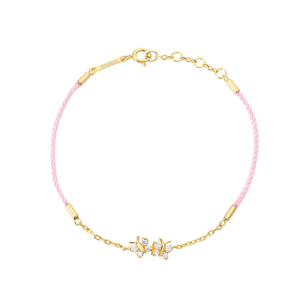 Enchanting Flutterfly™ gold vermeil butterfly bracelet on a pink silk cord; a luxury adjustable friendship bracelet for women by Bloomtine. Dainty pink silk cord butterfly bracelet in gold vermeil; Bloomtine's Flutterfly™ corded jewellery perfect for a summer jewellery stack. 