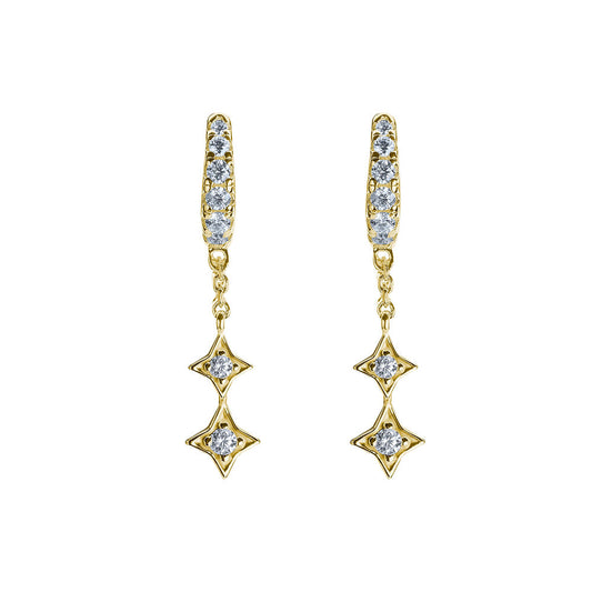 BLOOMTINE Mini Shooting Star gold star huggie earrings in 14K gold vermeil. A pair of 6mm hoop earrings featuring lab-grown moissanite stars for a curated ear stack