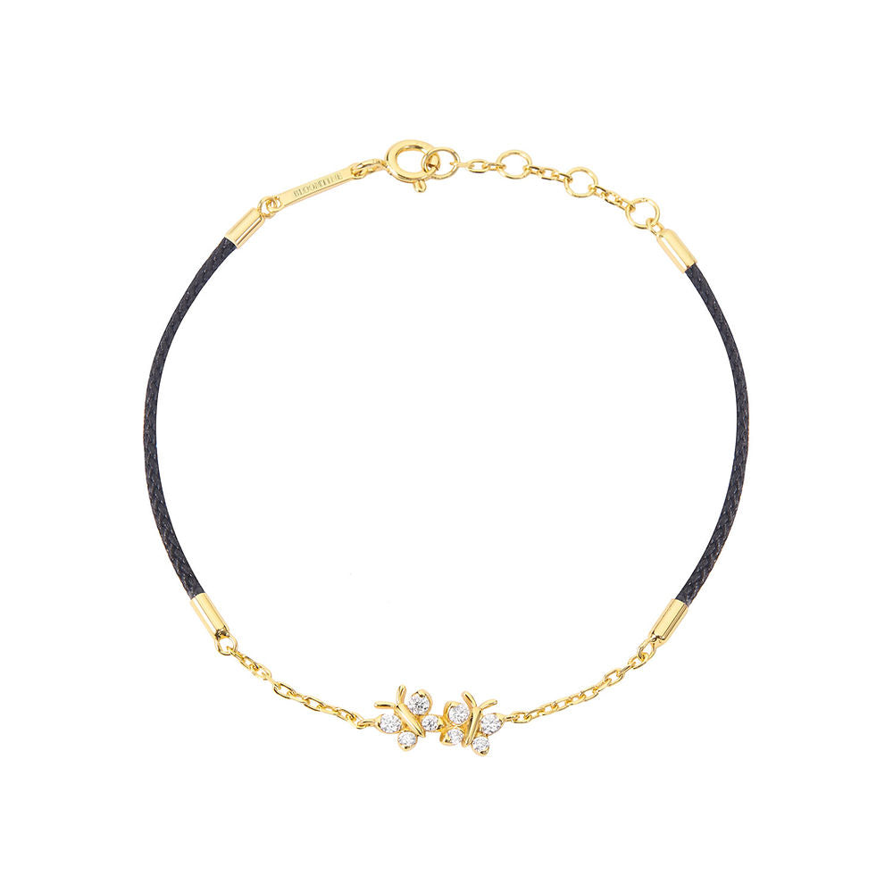 BLOOMTINE Enchanting Flutterfly butterfly bracelet in 14K gold vermeil. A black silk cord bracelet featuring 8 moissanites. Adjustable and durable gold vermeil jewelry for women