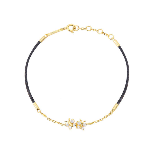 BLOOMTINE Enchanting Flutterfly butterfly bracelet in 14K gold vermeil. A black silk cord bracelet featuring 8 moissanites. Adjustable and durable gold vermeil jewelry for women
