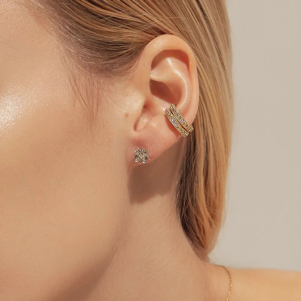 Eternal Bloom™ 14K White Gold Lotus Flower Diamond Earrings BLOOMTINE | Earth Angel HQ. A macro close-up of the BLOOMTINE Eternal Bloom 14K white gold earrings. A pair of 3D layered diamond lotus earrings featuring 12 encrusted round VS1 diamonds with secure butterfly push backs.