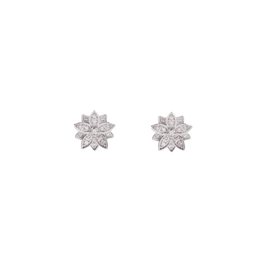 A macro close-up of the BLOOMTINE Eternal Bloom 14K white gold earrings. A pair of 3D layered diamond lotus earrings featuring 12 encrusted round VS1 diamonds with secure butterfly push backs.