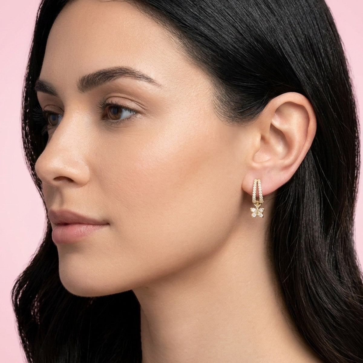 BLOOMTINE Flutterfly gold earrings in 14K gold vermeil. Mini gold hoop earrings with moissanite butterfly charms. Tarnish-resistant and meaningful jewelry for transformation
