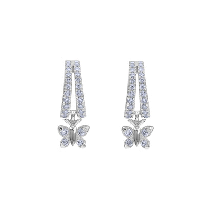 Enchanting Flutterfly™ Sterling Silver Butterfly Huggies image 6. Sterling silver butterfly huggie earrings by BLOOMTINE featuring sustainable lab-grown moissanites. These hypoallergenic, rhodium-plated hoops are a handcrafted talisman for 'extraordinary humans,' offering a high-brilliance, conflict-free alternative to diamond earrings