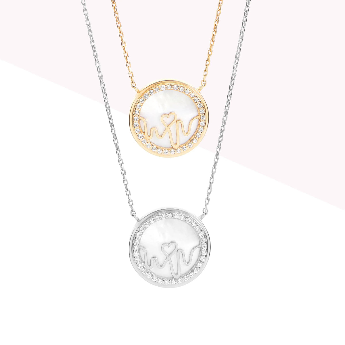 Bloomtine-set-of-necklaces-with-round-pendants. A professional-product-arrangement of multiple-necklaces featuring-circular-heart-medallion-charms on a crisp-white-background. This-collection includes-both-18kt-gold-vermeil and 925-sterling-silver-options, showcasing minimalist-round-pendants on fine-adjustable-chains. Ideal-for-jewellery-layering, these-versatile-necklaces are designed-for-gifting and highlight the-polished-finish and botanical-engravings of the-Bloomtine-Loves-Frequency-signature-collecti