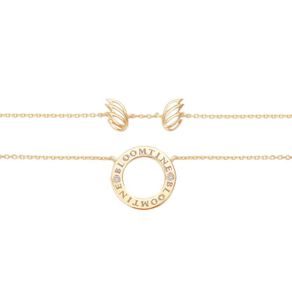 BLOOMTINE Mini Halo Wings gold angel necklace in 14K yellow gold vermeil. A 15mm halo pendant featuring two lab-grown diamonds and a unique angel wings pendant backing. Mini Halo Wings™ Diamond Gold Vermeil Angel Necklace BLOOMTINE | Earth Angel HQ