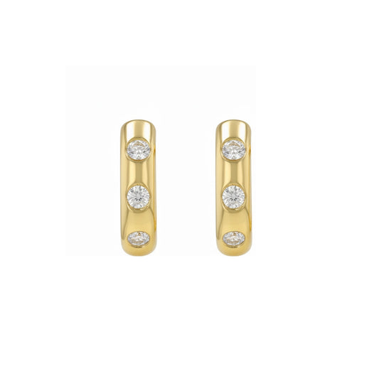 BLOOMTINE Mini Halo Wings gold earrings. These celestial-themed hoop earrings are crafted in 14K Gold Vermeil with flush-set moissanite. Ideal gold earrings for a curated ear stack or a luxury gift.