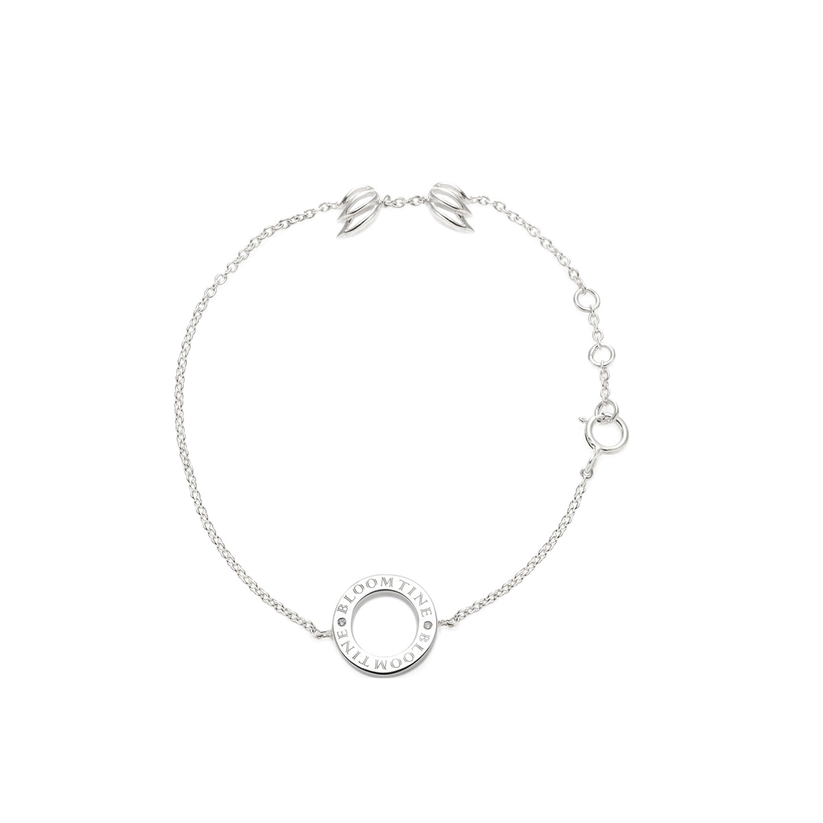 BLOOMTINE Mini Halo Wings silver bracelet in rhodium-plated sterling silver. Features two VVS lab diamonds and signature angel wing details. An adjustable diamond bracelet for effortless gifting BLOOMTINE sterling silver Mini Halo Wings™ bracelet. Hand-set with brilliant lab-grown diamonds and finished with premium white rhodium for a mesmerizing, diamond-like glow that lasts. White background