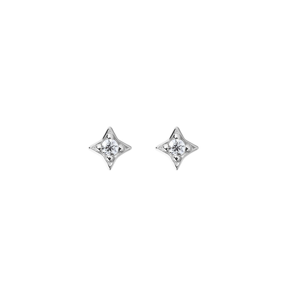 BLOOMTINE Mini silver star studs in rhodium-plated sterling silver. 4-pointed star earrings set with brilliant moissanites. Sustainable and tarnish-resistant minimalist silver jewelry