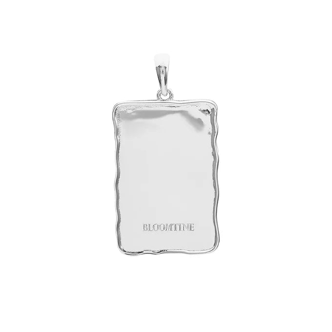 A BLOOMTINE Sterling Silver Angel Wing Pendant, designed as a talisman for protection. This intricately detailed silver wing necklace is shown on a clean white background, highlighting the premium rhodium-plated finish and the symbolic 'Extraordinary Human' craftsmanship