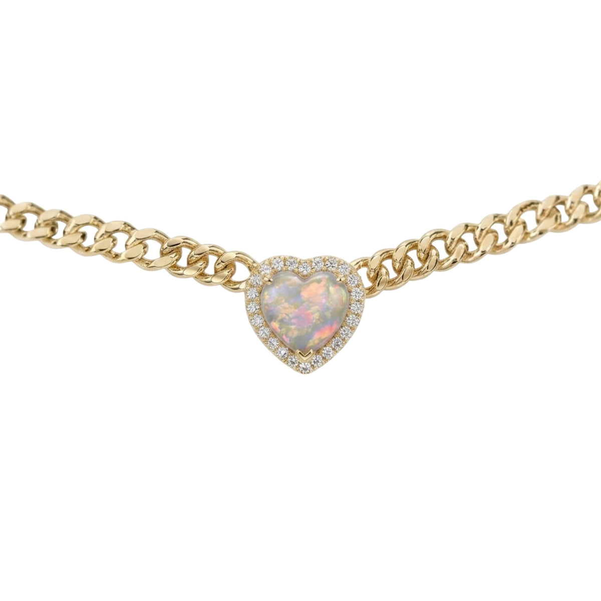 Gold chain necklace with a heart-shaped opal pendant on a white background