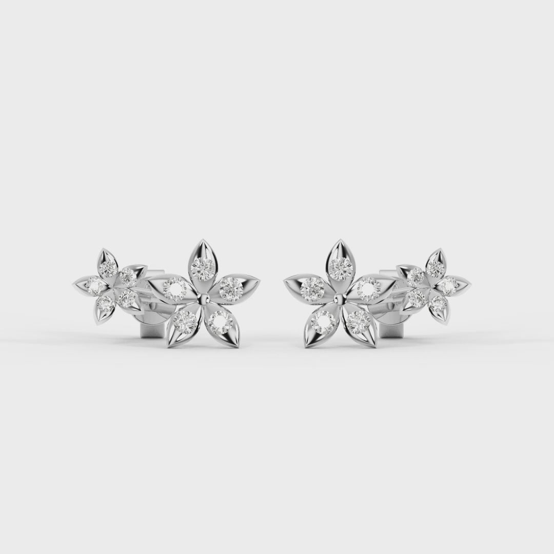 Bloomtine-sterling-silver-eternal-bloom-earrings. A high-quality-product-shot of 925-sterling-silver-flower-studs, designed-as-the-perfect-gift-for-her. These-dainty-floral-earrings feature a polished-silver-blossom-design and are crafted-from-genuine-solid-sterling-silver. Shown-on-a-clean-white-background, these-minimalist-botanical-studs highlight the-intricate-craftsmanship and timeless-style of the Bloomtine-silver-jewellery-collection